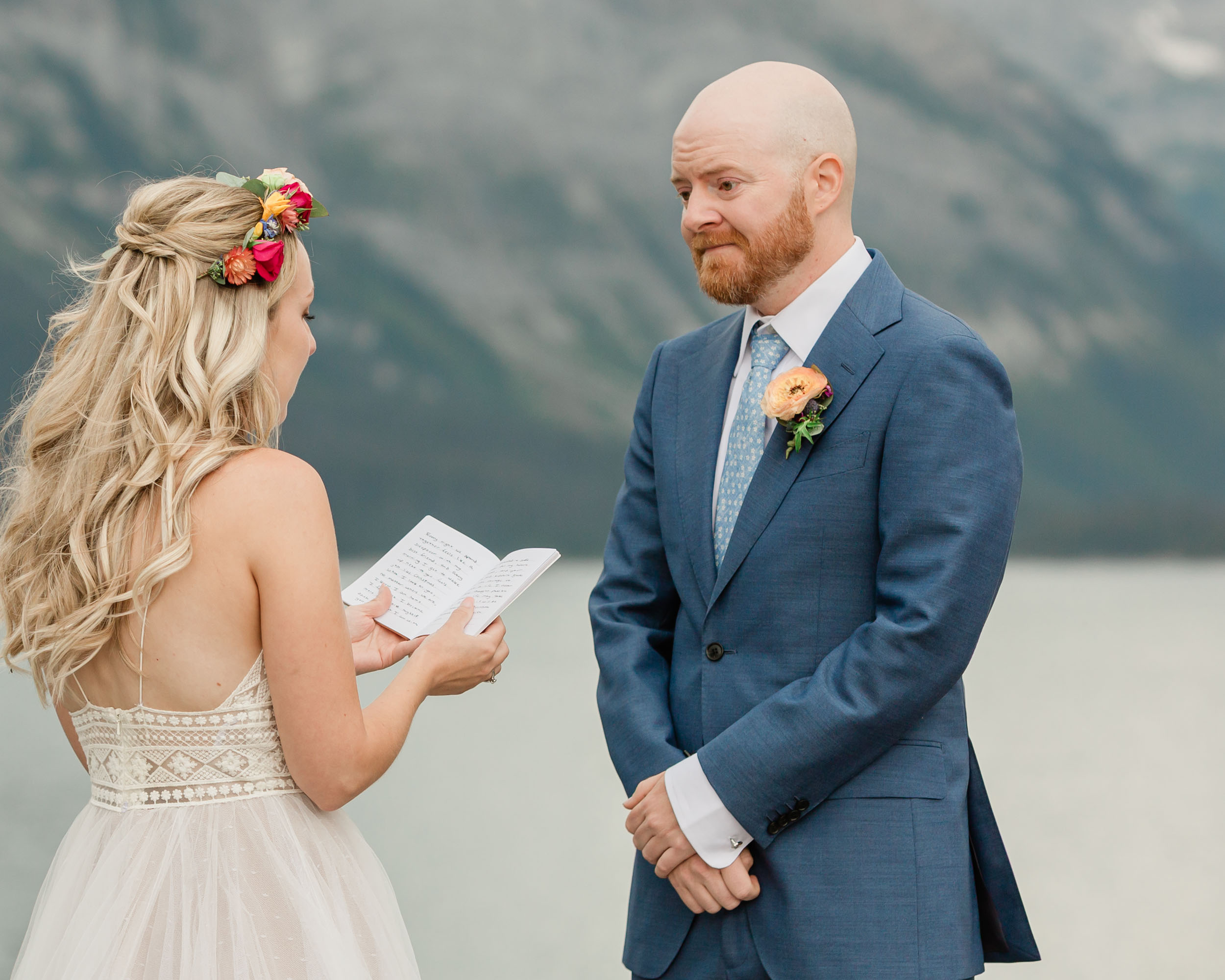 the couple reciting their vows for their kananaskis mountain elopement