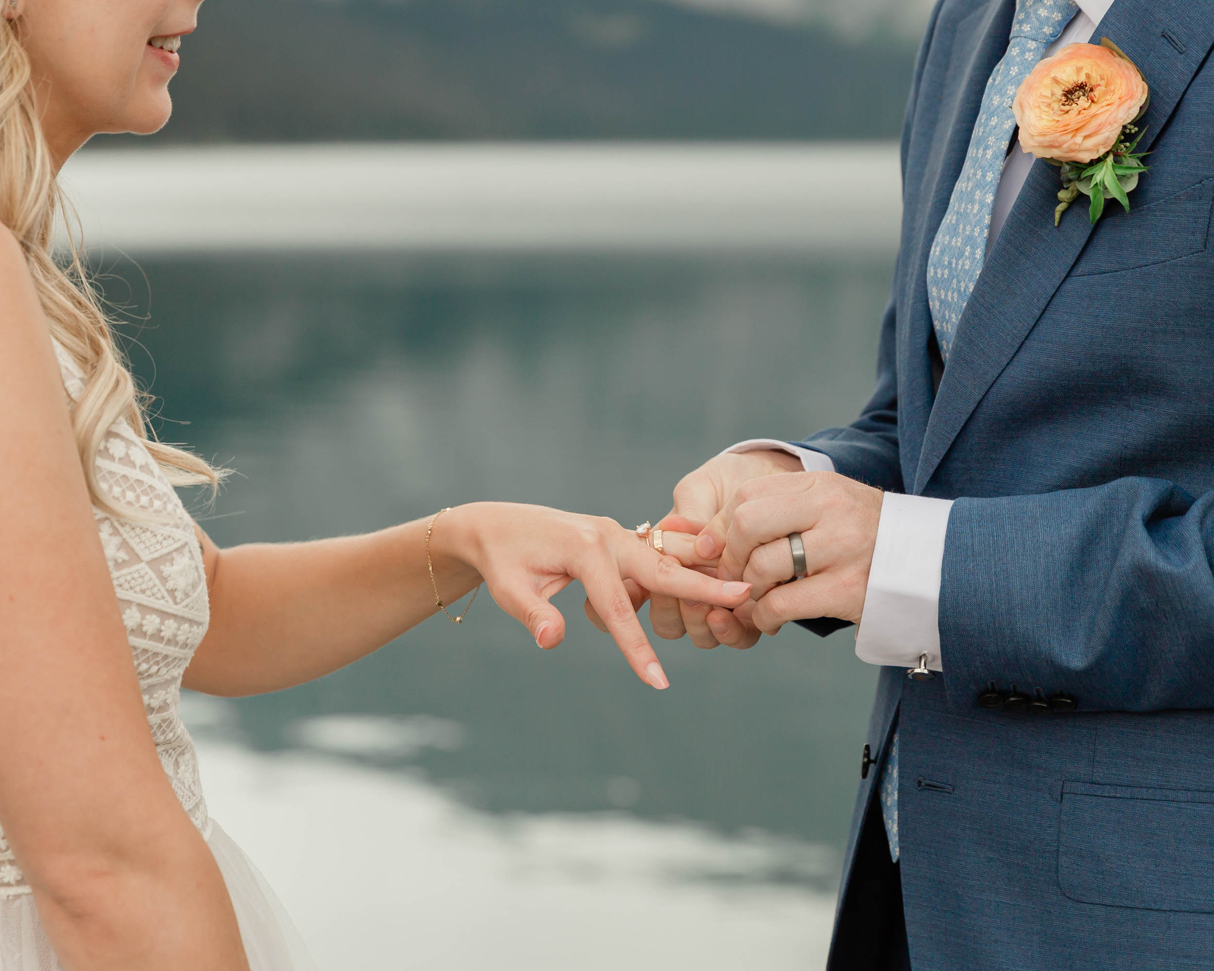the couple reciting their vows and exchanging rings for their kananaskis mountain elopement ceremony