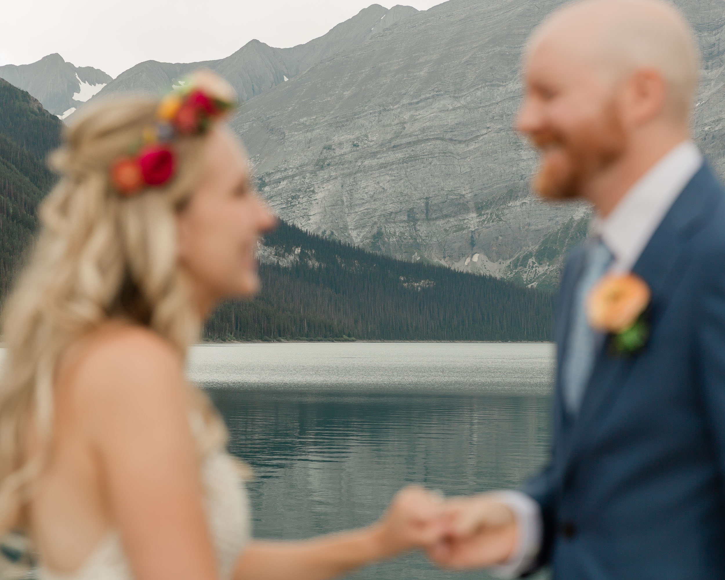 the couple reciting their vows for their kananaskis mountain elopement