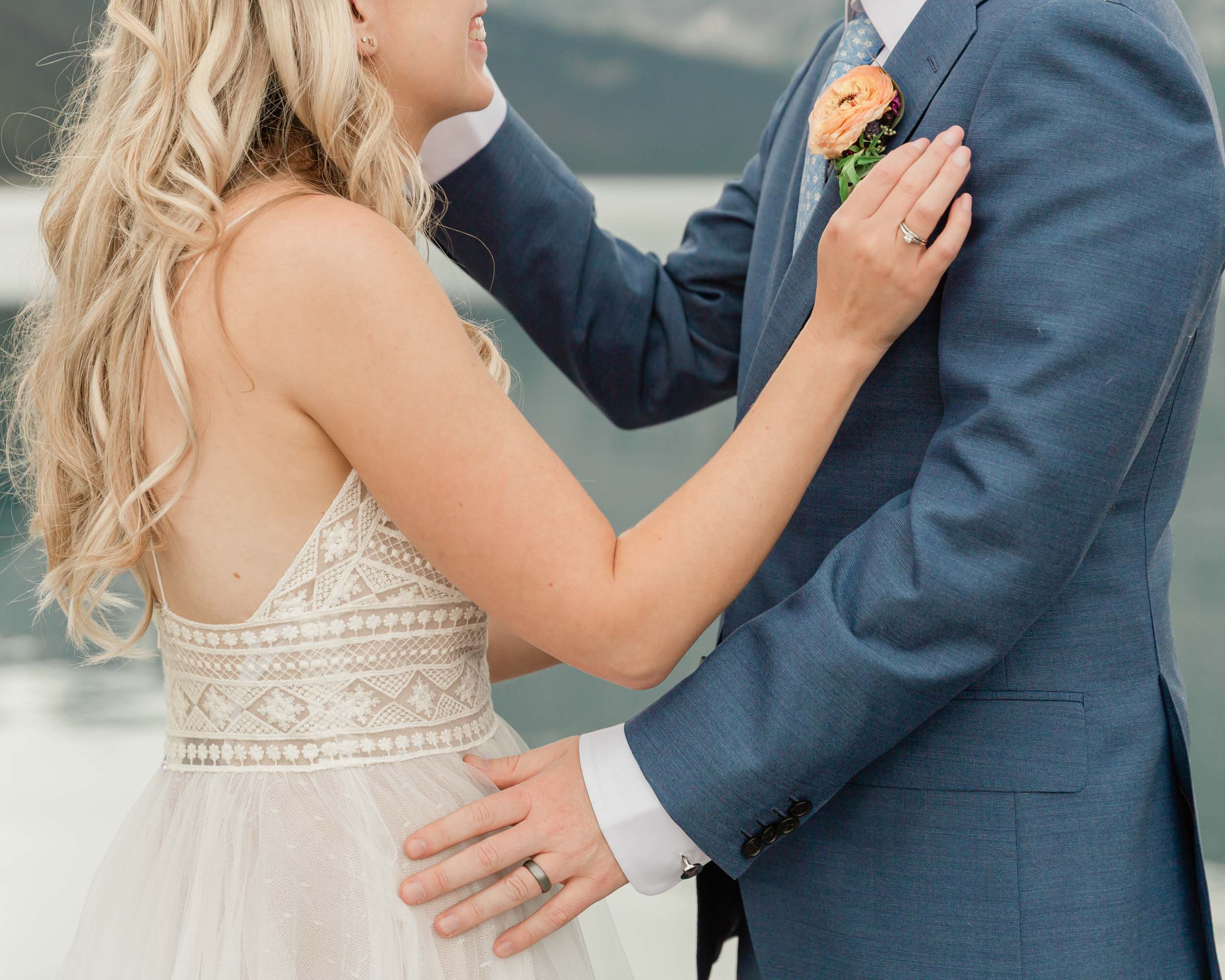 the couple reciting their vows and exchanging rings for their kananaskis mountain elopement ceremony