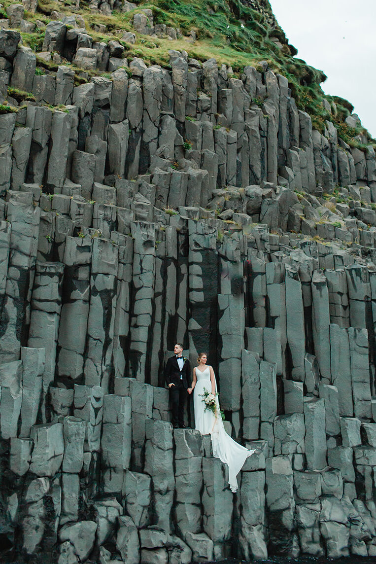 See Michael & Nicole's Iceland beach elopement on Iceland's South Coast, with waterfalls, black sand beaches, and planning inspiration.