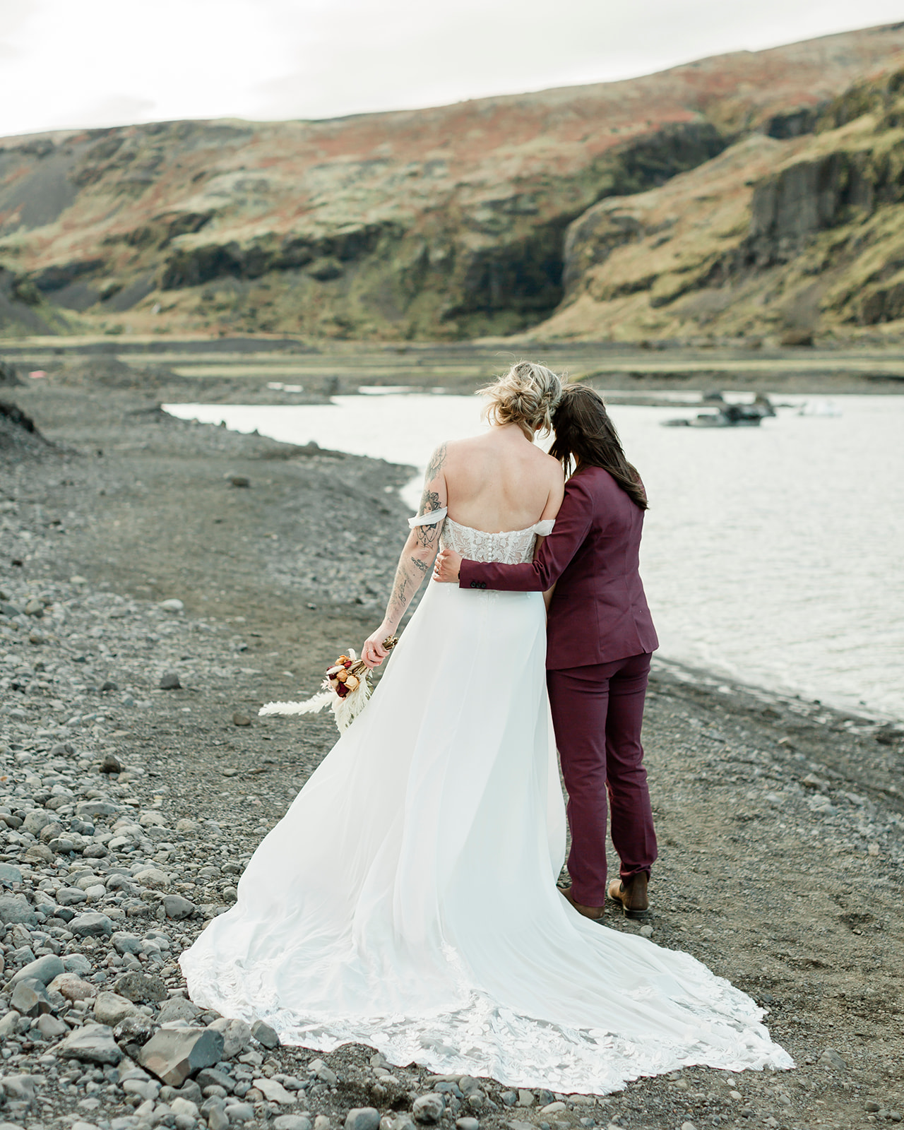 Planning a South Iceland elopement? See Kendra and Val's unforgettable wedding featuring waterfalls, a glacier, and the stunning landscapes around Vík