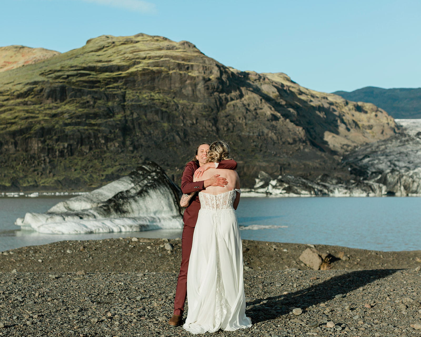 Planning a South Iceland elopement? See Kendra and Val's unforgettable wedding featuring waterfalls, a glacier, and the stunning landscapes around Vík