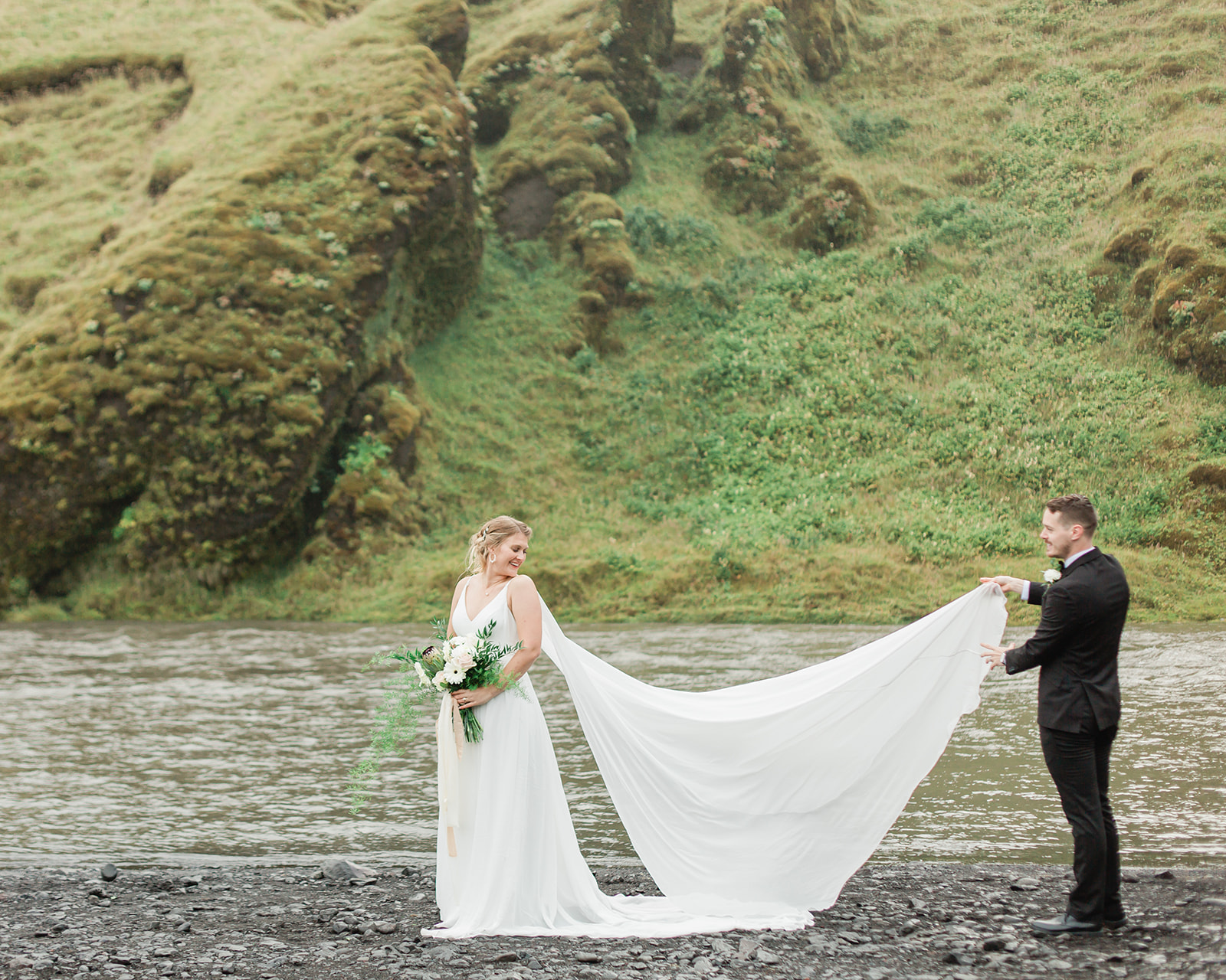 See Michael & Nicole's Iceland beach elopement on Iceland's South Coast, with waterfalls, black sand beaches, and planning inspiration.